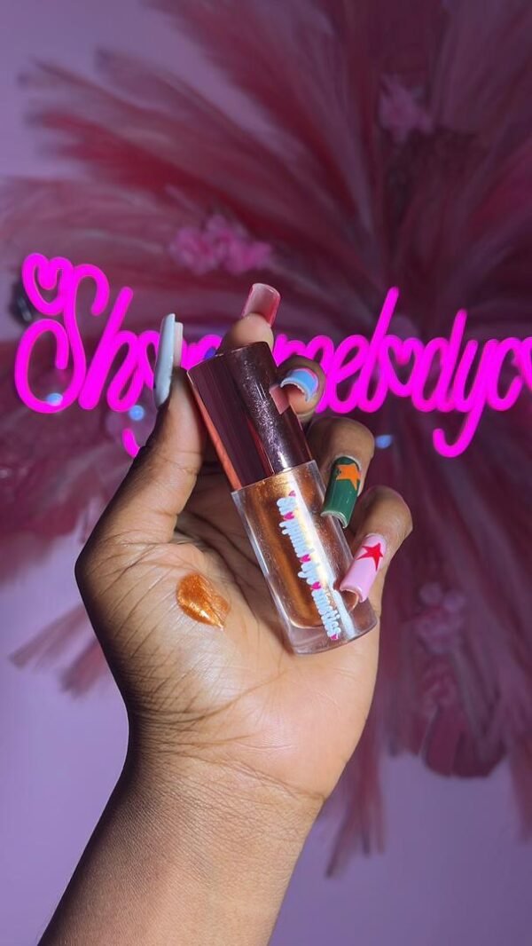 9ea4cd41-7a10-42cf-b47c-8641a1884979 Bronze Lip Gloss🪞